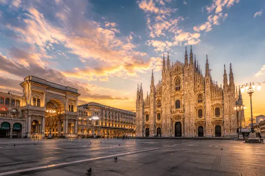 Milan Duomo Cathedral at sunrise, one of the most iconic landmarks in Milan, Italy.