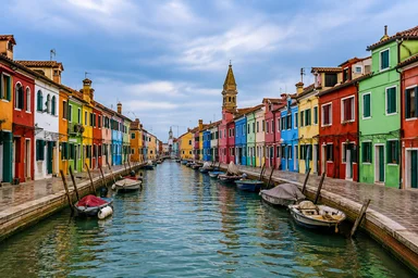 Colorful houses along a canal in Burano Venice, private chauffeur transfer to Venice