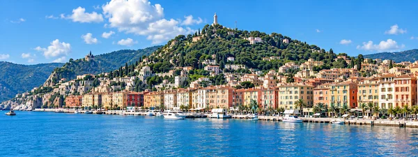 Genoa waterfront with colorful buildings and the Ligurian Sea