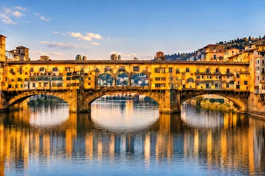Ponte Vecchio over the Arno River in Florence during a private transfer from Milan to Florence
