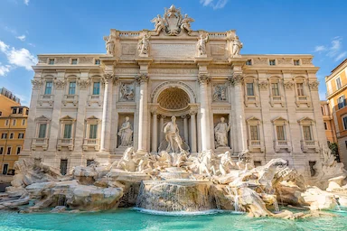 Trevi Fountain in Rome with Baroque sculptures and turquoise water