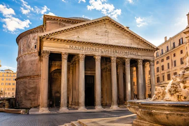 Pantheon in Rome with ancient Roman columns and the fountain in Piazza della Rotonda