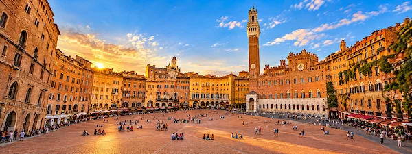 Piazza del Campo in Siena with Torre del Mangia at sunset