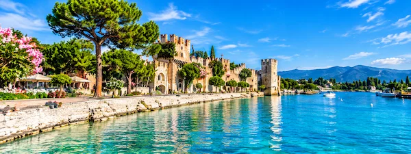 Sirmione lakeside promenade and Scaliger Castle on Lake Garda