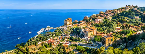 Tuscan coast near Pisa with Mediterranean sea and hillside village